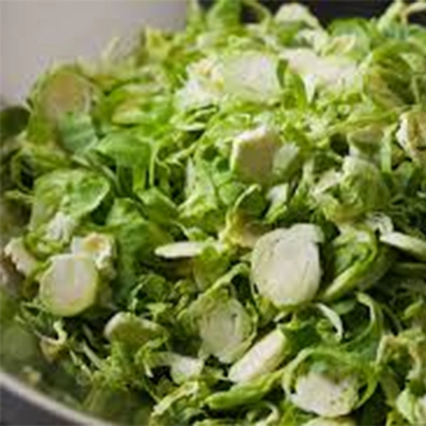 Shredded Brussels Sprouts with Aged Cheddar